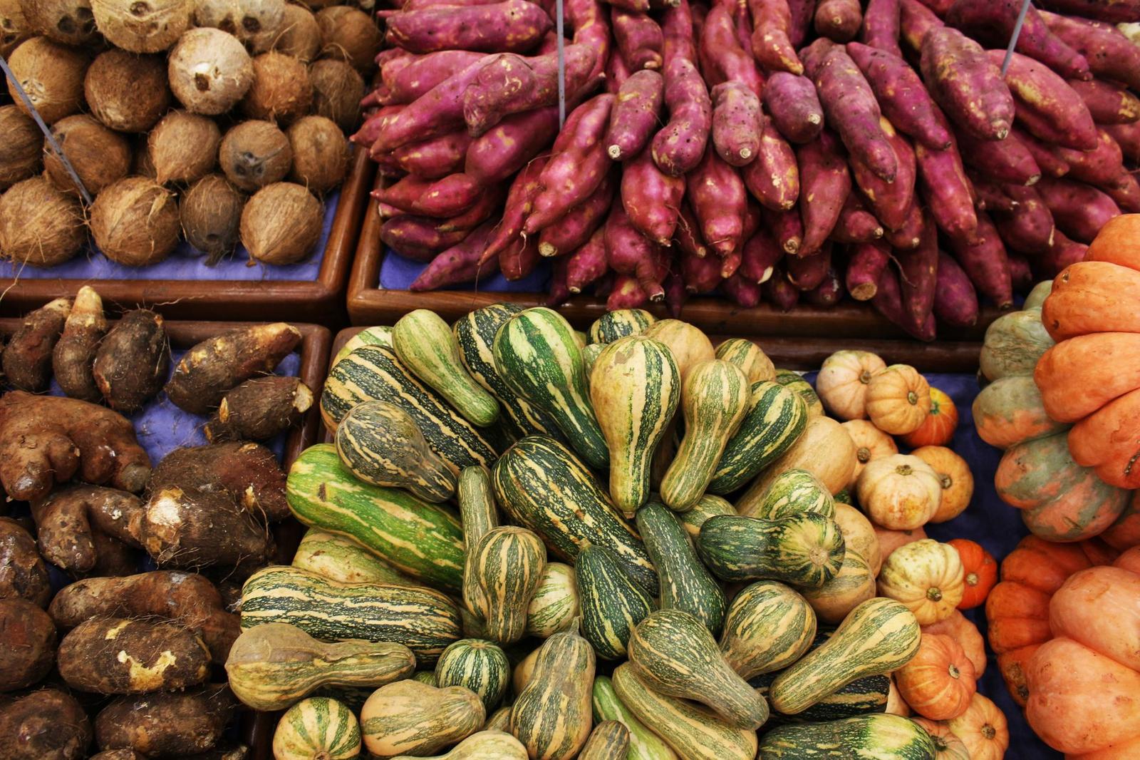 Stack of Zucchini on a Market Stall